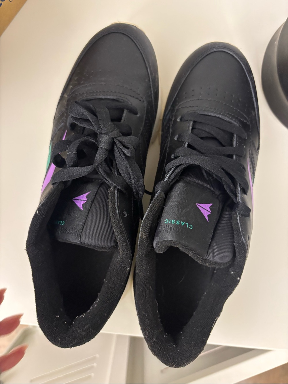 Reebok Black Sneakers with Subtle Purple Accent